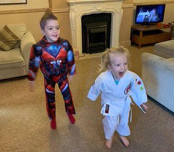 Children age 3 to 6 enjoying a live streamed karate lesson